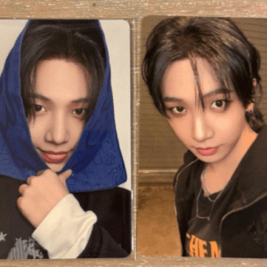 Two glossy photo cards of a young man: left card shows him with a blue scarf draped over his head and hand near chin, right card shows him in a black jacket looking at the camera with longer fringe.