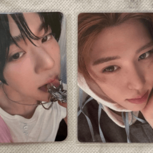 Two photo cards showing a person; left card shows a close-up with black hair biting a silver necklace, right card shows a close-up in a hoodie looking at the camera.