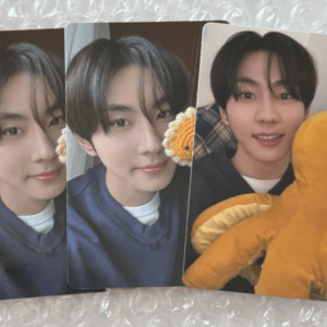 Three-panel photo collage of a young man with dark hair in a navy sweater, posing with a yellow flower and an orange plush toy.