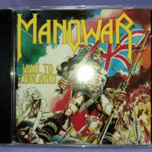 Album cover for Manowar’s Hail to England: a muscular warrior charges with a sword amid a fiery battle, Union Jack flag in the background.