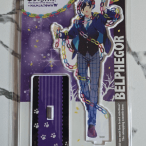 Packaging for an Obey Me! Belphegor standee figure, showing a full-body cutout of Belphegor in a blue suit with colorful chain decorations, and a purple card-shaped accessory on the left