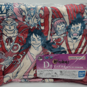 Colorful anime towel featuring multiple characters in red outfits, still in plastic packaging with a Bandai Namco label visible.  Articulos Japan (Post Box Japan)