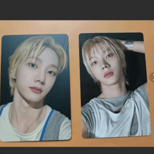 Two vertical portrait photos of a young person with blonde hair on an orange surface; left card shows casual white/grey outfit, right card shows similar pose with hand behind head.