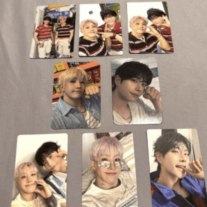 Nine photo cards arranged on a soft surface, each showing a young person posing in casual outfits in various selfies or group shots.