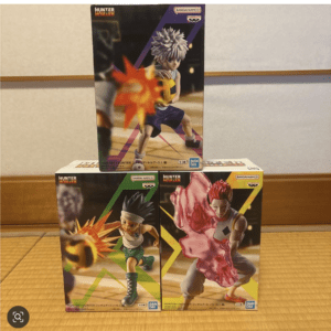 Three boxed Hunter x Hunter figures (Killua, Gon, and Hisoka) arranged on a tatami mat, by Bandai Namco/ Bandai.  Articulos Japan (Post Box Japan)