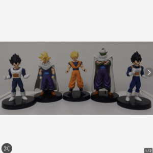 Five Dragon Ball action figures lined up on black bases on a shelf. Includes characters with blue suits, yellow hair, orange gi, and a green-cloaked figure.