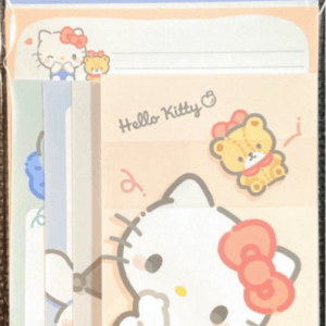 Hello Kitty–themed stationery set with pastel envelopes and notepads, showing a large Hello Kitty with pink bow and a small yellow bear in a cute design.