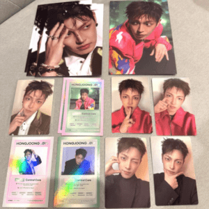 Assorted glossy photo cards featuring a male model in various outfits, laid out on a light grey surface.