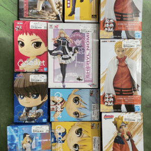 A rack displaying multiple boxed anime figures in varied colors and sizes, including Qposket and other character figures.