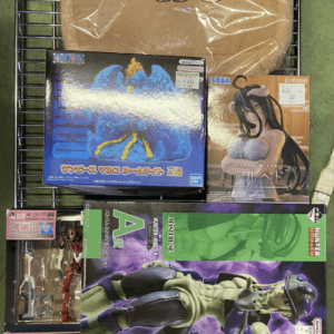 Tan blanket or cushion with a sleeping sheep illustration, wrapped in plastic, on a wire shelf. (Informative visual item on top shelf)