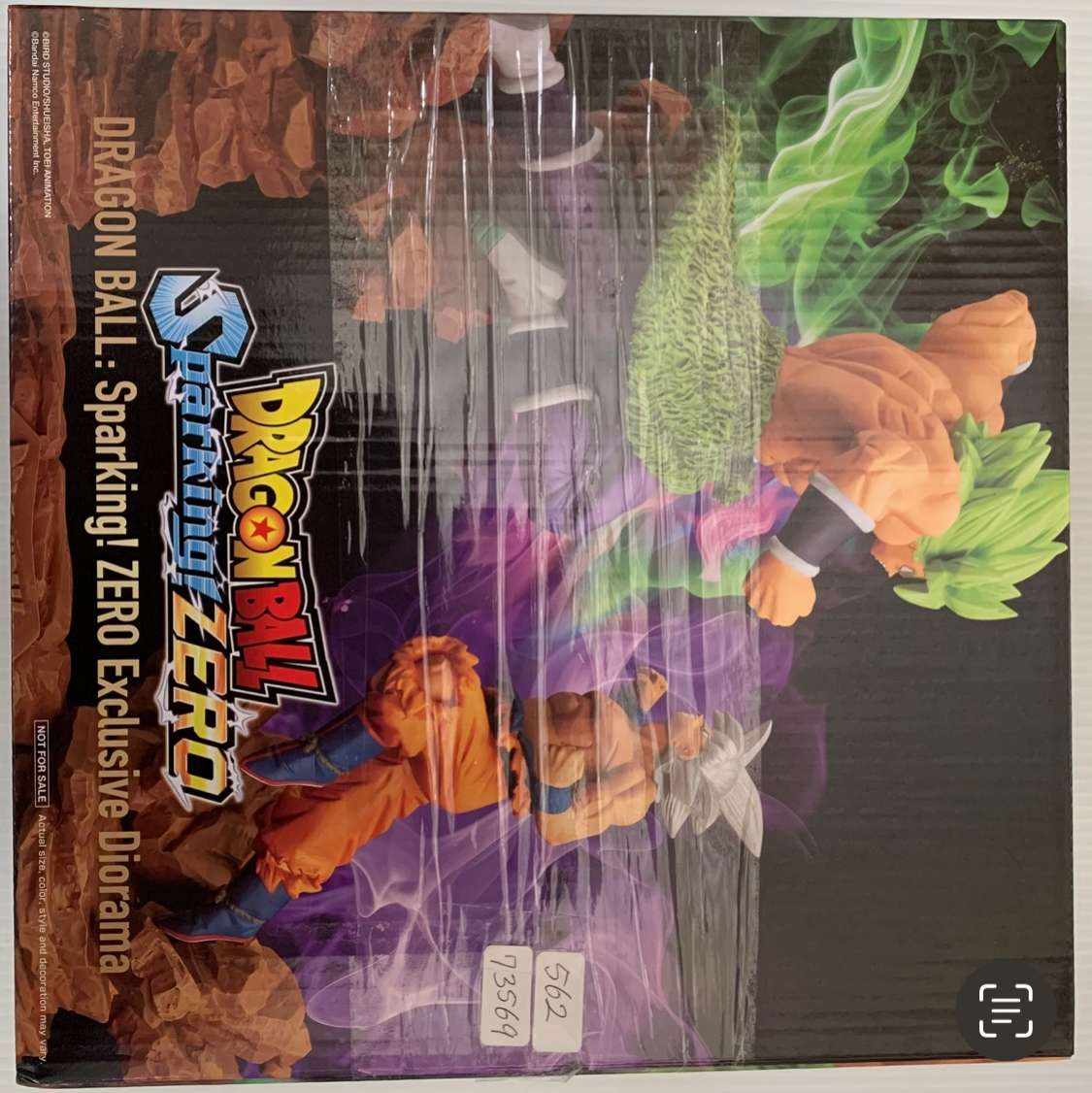 Img_2566 - Articulos Japan (post Box Japan) Box art for Dragon Ball Z Sparking! ZERO Exclusive Diorama, showing multiple Dragon Ball Z figures in a rocky, smoky landscape. Articulos Japan (Post Box Japan)