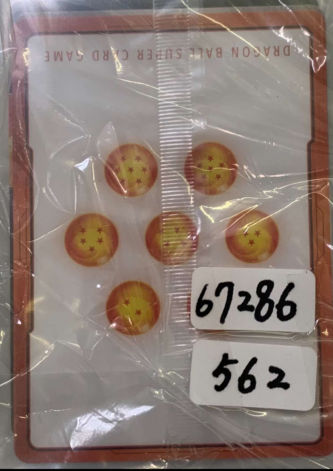 Img_2580 - Articulos Japan (post Box Japan) Five Dragon Balls from Dragon Ball arranged on a card inside plastic packaging. Articulos Japan (Post Box Japan)