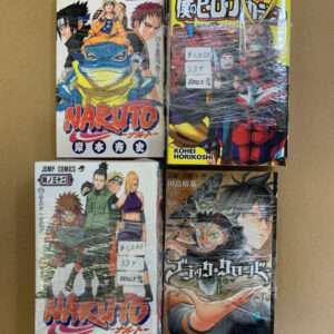 Four manga volumes in plastic wrap: Naruto (left), My Hero Academia (top right), Naruto (bottom left), and Black Clover (bottom right).