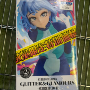 Boxed My Hero Academia Glitter & Glamours figure of Nejire Hadō II, blue-haired heroine, with a yellow promotional sash across the front; Bandai logo visible.