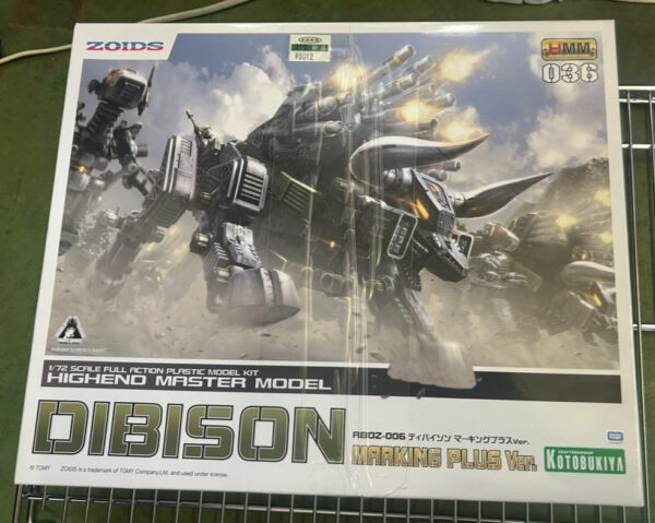 Img_e0703 - Articulos Japan (post Box Japan) Box art showing a large robotic battle machine firing missiles in a smoky, chaotic battlefield scene. Articulos Japan (Post Box Japan)