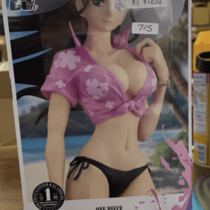 Boxed One Piece Glitter & Glamours figure: Nico Robin in a pink floral bikini top and black bottoms, beach background visible with price tag on package.