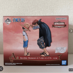 Box for a One Piece collectible figure showing Luffy and Shanks; Shanks places the straw hat on young Luffy.