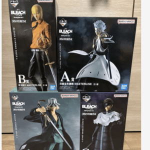Four Bleach Masterlise action-figure boxes (A, B, C) on a wooden surface, showing anime characters in dynamic poses by Bandai Namco.