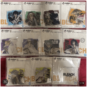 Packaged Bleach F acrylic stand figures in plastic bags, showing multiple character designs from the anime series.