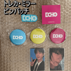 Bubble-wrapped background displaying three Echo pin badges (blue, yellow, pink), a pink Echo card, and two photo cards of a man and a woman; Japanese title text at top.
