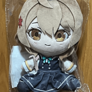 Plush doll of a cute anime girl with blonde hair and yellow eyes, wearing a navy blue school uniform with a teal bow, inside a clear plastic bag.  Articulos Japan (Post Box Japan)
