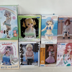 Row of boxed anime figures from various brands lined up on a white surface.