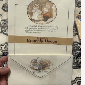 Cover of Jill Barklem's Brambly Hedge featuring a round image of animals, with an Autumn Story envelope illustration beneath.