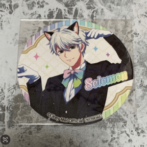Circular fan badge featuring an anime character with white hair and cat ears, wearing a black suit and colorful bow tie, with 'Solomon' text in pastel colors.