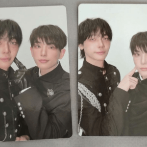 Two cards showing two young men in black uniforms with silver cords, posing side by side.