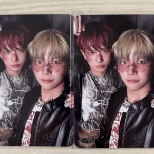 Two identical photo cards showing two young people posing together: one with burgundy hair, the other with blond hair wearing pink sunglasses and a black leather jacket.