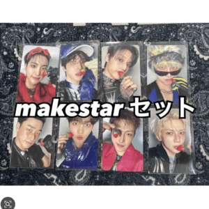 Nine glossy idol photo cards in a 3x3 grid with a bold 'makestar セット' overlay on a patterned background.