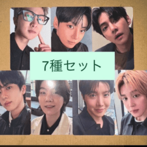 Collage of seven male portraits arranged in a grid on a brown background, with a green label in the center reading '7種セット' (7-piece set).