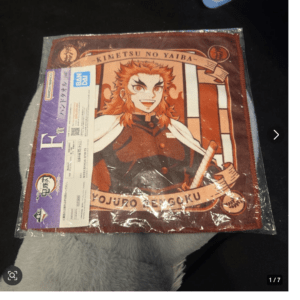 90889 Demon Slayer: Kimetsu no Yaiba - Kyojuro Rengoku Hand Towel (Ichiban Kuji)